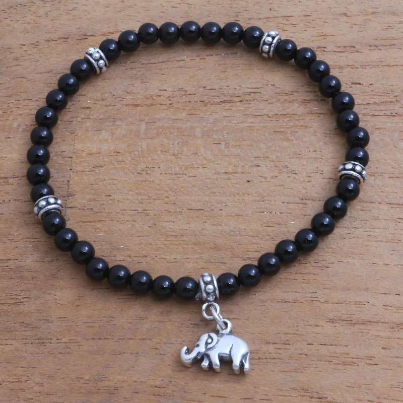 Handcrafted silver cuff bracelets for stacking-Elephant Dangle Onyx Elephant Beaded Stretch Bracelet from Bali