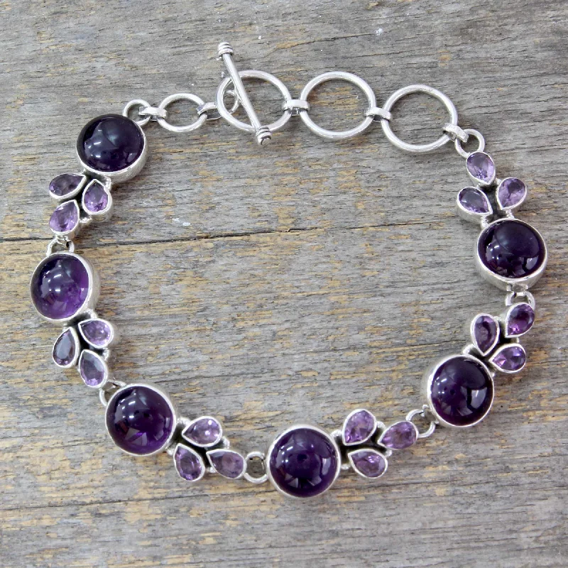 Trendy gemstone bangle bracelets for wellness-Glorious Purple Artisan Crafted Silver Link Bracelet with Amethysts