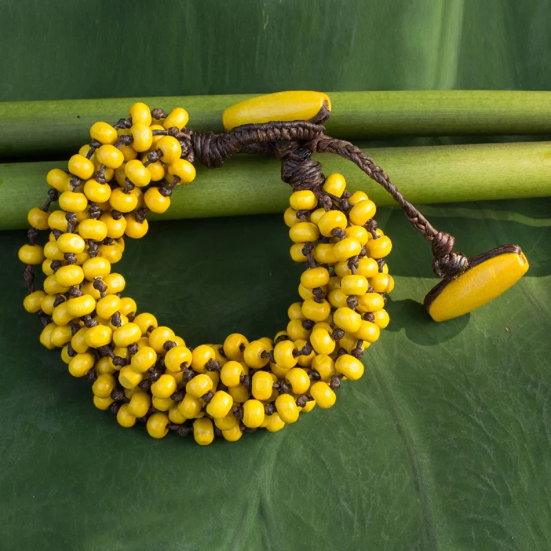 Custom silver bracelet sets for stacking-Phrae Belle Wood Beaded Jewelry Yellow Torsade Bracelet