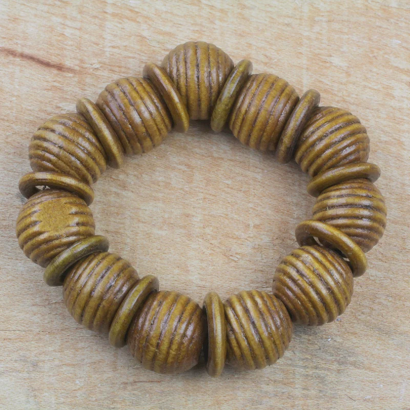 Handcrafted gemstone bracelets with silver charms-Royal Rings Brown Sese Wood Beaded Stretch Bracelet from Ghana