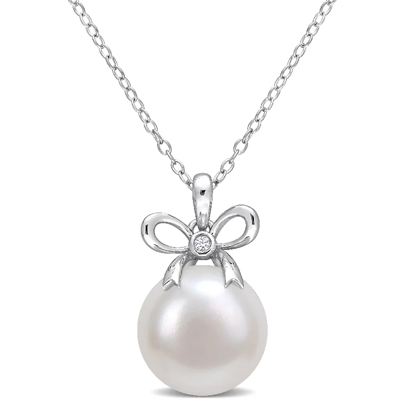 silver and gold necklace for casual style-Miadora Sterling Silver Cultured Freshwater Pearl & Created White Sapphire Bow Necklace (12-12.5mm)