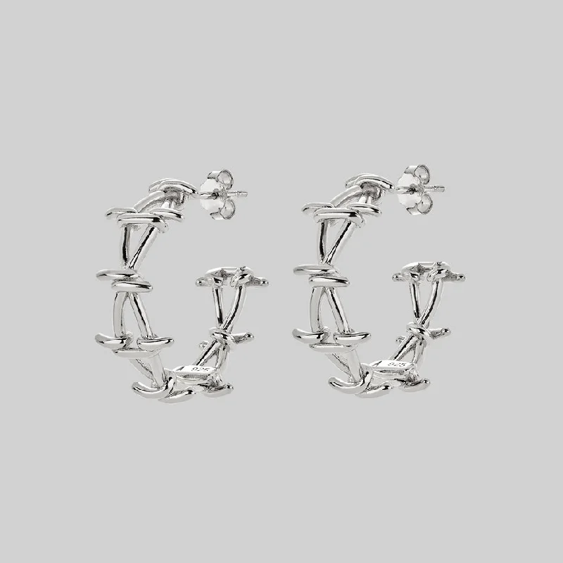 bold drop earrings for a statement piece -BEYOND. Barbed Wire Hoop Earrings - Silver