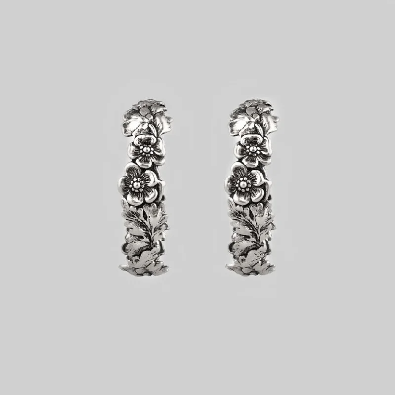 playful geometric earrings for a unique twist -DAHLIA. Floral Garland Hoop Earrings - Silver