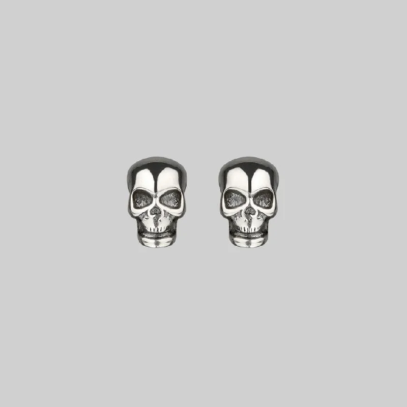 sparkling cubic zirconia earrings for dazzling beauty -EDIE. Tiny Sterling Silver Skull Studs