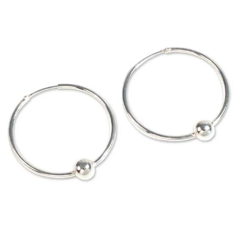 large statement earrings for unique fashion -NOVICA Luminous Orbits, Sterling silver hoop earrings - 2*1.9